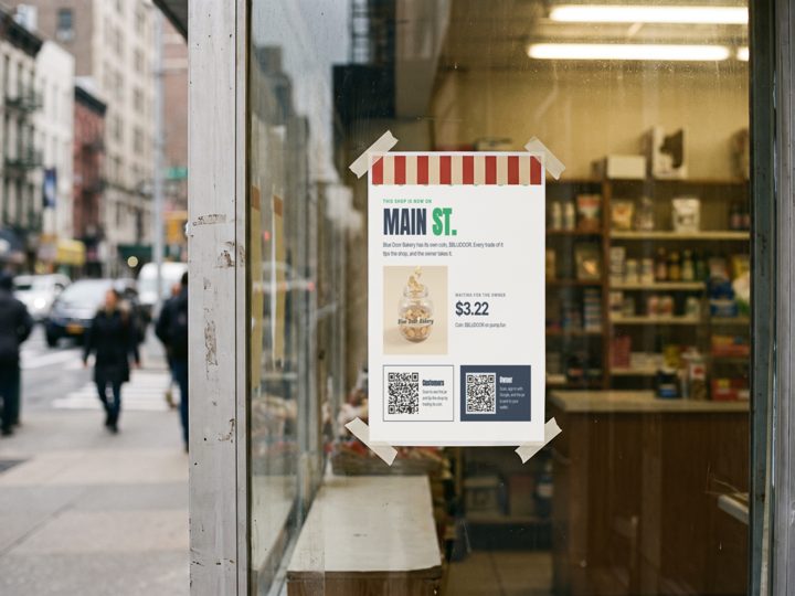 A Main St poster in a shop window